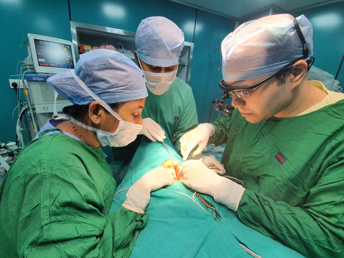 Dr. Sabyasachi Chakrabarti performing surgery at Nabanir Hiospital